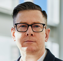 Dirigente esecutivo di una società di trading crypto, il CEO Alexander Hughes in ritratto